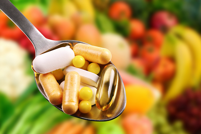 bigstock Spoon With Dietary Supplements 70069831